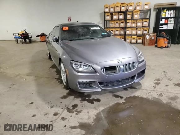 ✅ 2013 BMW 6 Series 650i xDrive • VIN: WBA6B4C53DD098830 • Lot: 67596165. Wystawiony na Copart z przebiegiem 86 598 mil. Bezpłatny archiwum sprzedaży aukcyjnych z USA i szczegółowy raport historii pojazdu na DreamBid. Zdjęcie 13.
