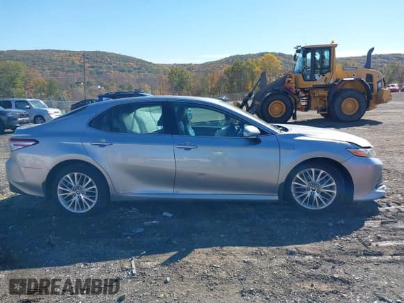 ✅ 2020 Toyota Camry Hybrid XLE • VIN: 4T1F31AKXLU542108 • Lot: 43499731. Listed on IAAI with 122,900 mi. Free auction sales archive from the USA and detailed vehicle history report at DreamBid. Image 13.