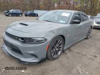 ✅ 2023 Dodge Charger Scat Pack • VIN: 2C3CDXGJ3PH699434 • Lot: 43684080. Listed on IAAI with 7,649 mi. Free auction sales archive from the USA and detailed vehicle history report at DreamBid. Image 2.