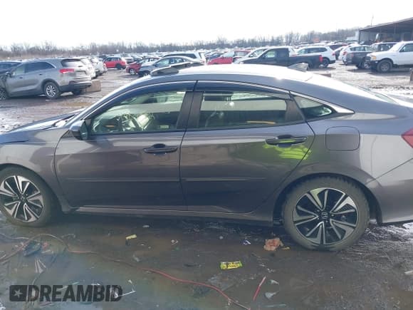 ✅ 2018 Honda Civic EX-L • VIN: JHMFC1F85JX014701 • Лот: 41467342. Опубликован ранее на IAAI с пробегом 50 292 миль. Бесплатный доступ к архиву аукционных продаж из США и подробный отчёт об истории автомобиля на DreamBid. Изображение 15.