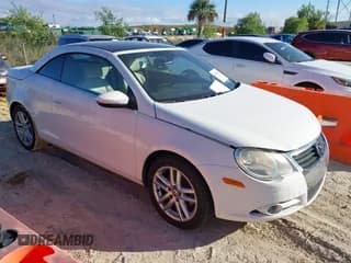 ✅ 2009 Volkswagen Eos Lux • VIN: WVWFA71F19V010801 • Lot: 43906282. Listed on IAAI with 105,505 mi. Free auction sales archive from the USA and detailed vehicle history report at DreamBid. Image 1.