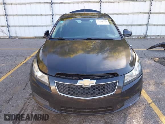 2012 Chevrolet Cruze 1LT z VIN 1G1PF5SC2C7387396, wystawiony jako IAAI lot #43401730 z przebiegiem 137 692 mil mil oraz . Historia ofert i sprzedaży dostępna na DreamBid. Obrazek 13.