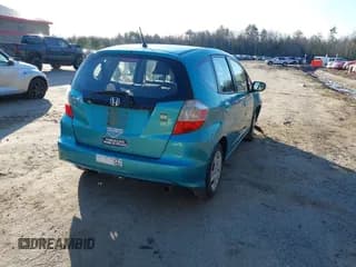 ✅ 2013 Honda Fit • VIN: JHMGE8H32DC000226 • Lot: 42048971. Listed on IAAI with 124,255 mi. Free auction sales archive from the USA and detailed vehicle history report at DreamBid. Image 4.