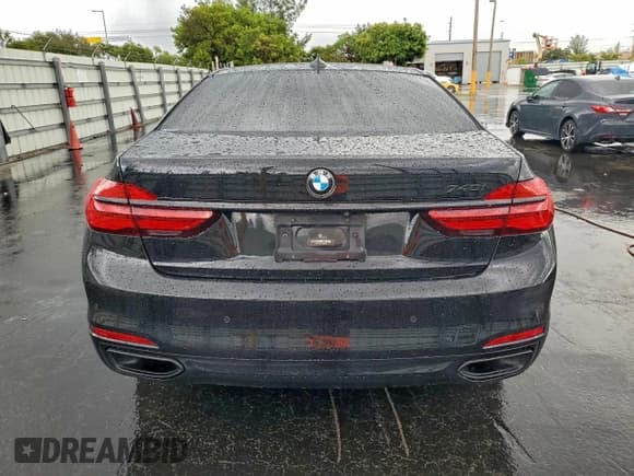 ✅ 2016 BMW 7 Series 740i • VIN: WBA7E2C51GG738729 • Lot: 95914555. Listed on Copart with 109,302 mi. Free auction sales archive from the USA and detailed vehicle history report at DreamBid. Image 6.