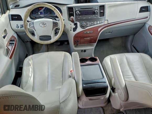 ✅ 2012 Toyota Sienna XLE • VIN: 5TDYK3DC5CS255778 • Lot: 94214015. Listed on Copart with 114,207 mi. Free auction sales archive from the USA and detailed vehicle history report at DreamBid. Image 8.