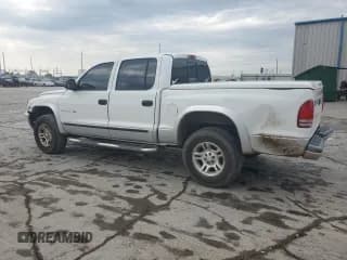 ✅ 2002 Dodge Dakota SLT • VIN: 1B7HG48N22S614075 • Lot: 57783905. Wystawiony na Copart z przebiegiem 247 769 mil. Bezpłatny archiwum sprzedaży aukcyjnych z USA i szczegółowy raport historii pojazdu na DreamBid. Zdjęcie 2.
