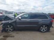 ✅ 2014 Jeep Grand Cherokee Overland • VIN: 1C4RJFCG6EC211600 • Lot: 43289489. Listed on IAAI with 133,935 mi. Free auction sales archive from the USA and detailed vehicle history report at DreamBid. Image 15.