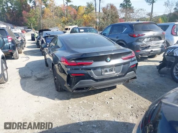 ✅ 2022 BMW 8 Series M850i xDrive • VIN: WBABC4C06NCG86571 • Lot: 43616622. Listed on IAAI with 5,383 mi. Free auction sales archive from the USA and detailed vehicle history report at DreamBid. Image 3.
