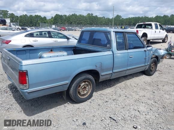 ✅ 1985 Nissan 720 • VIN: 1N6ND06S6FC344794 • Lot: 42618890. Listed on IAAI with 1,630,440 mi. Free auction sales archive from the USA and detailed vehicle history report at DreamBid. Image 4.