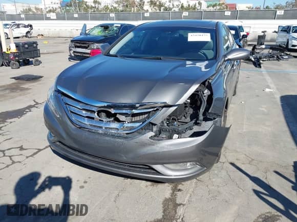 2013 Hyundai Sonata SE with VIN 5NPEC4AB7DH621765, listed as a IAAI auction lot 43450475 with 127,708 mi miles and . Bid and sale history available at DreamBid. Image 6.