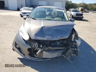 ✅ 2014 Ford Fiesta Titanium • VIN: 3FADP4CJ2EM232988 • Lot: 87364135. Wystawiony na Copart z przebiegiem 148 880 mil. Bezpłatny archiwum sprzedaży aukcyjnych z USA i szczegółowy raport historii pojazdu na DreamBid. Zdjęcie 5.