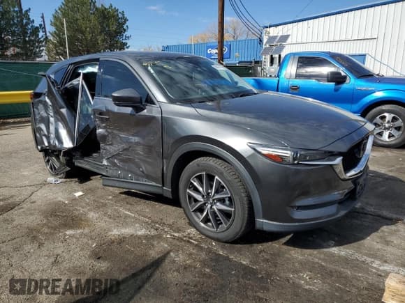 ✅ 2018 Mazda CX-5 Grand Touring • VIN: JM3KFBDMXJ0375578 • Lot: 89924145. Listed on Copart with 74,460 mi. Free auction sales archive from the USA and detailed vehicle history report at DreamBid. Image 4.