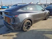 ✅ 2026 Tesla Model Y Long Range • VIN: 7SAYGDED5TF387106 • Lot: 94750455. Listed on Copart with 3,299 mi. Free auction sales archive from the USA and detailed vehicle history report at DreamBid. Image 3.