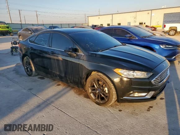 ✅ 2018 Ford Fusion SE • VIN: 3FA6P0HD0JR183615 • Lot: 86271085. Listed on Copart with 130,585 mi. Free auction sales archive from the USA and detailed vehicle history report at DreamBid. Image 4.