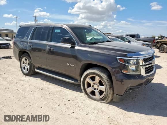 2015 Chevrolet Tahoe LT с VIN 1GNSCBKC2FR308446, выставлен на аукционе Copart как лот 69120375 с пробегом 169 986 миль миль и Списание • Salvage title. История ставок и продаж доступна на DreamBid. Изображение 4.