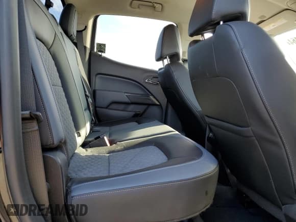 ✅ 2021 Chevrolet Colorado 4WD Z71 • VIN: 1GCGTDEN3M1142862 • Лот: 71504164. Опубликован ранее на Copart с пробегом 34 617 миль. Бесплатный доступ к архиву аукционных продаж из США и подробный отчёт об истории автомобиля на DreamBid. Изображение 10.