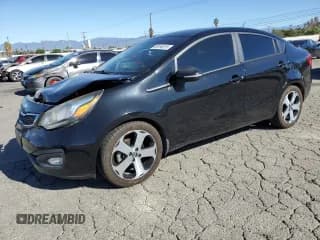 ✅ 2013 Kia Rio SX • VIN: KNADN4A38D6233742 • Lot: 86194815. Listed on Copart with 111,556 mi. Free auction sales archive from the USA and detailed vehicle history report at DreamBid. Image 1.