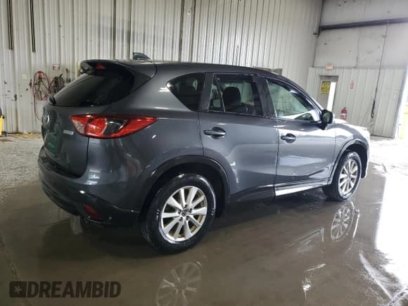 ✅ 2015 Mazda CX-5 Touring • VIN: JM3KE2CY6F0506259 • Lot: 69928775. Listed on Copart with 140,555 mi. Free auction sales archive from the USA and detailed vehicle history report at DreamBid. Image 3.