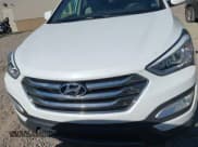 ✅ 2014 Hyundai Santa Fe • VIN: 5XYZUDLB4EG175627 • Lot: 43428688. Listed on IAAI with 150,000 mi. Free auction sales archive from the USA and detailed vehicle history report at DreamBid. Image 12.