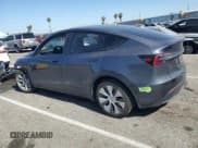 ✅ 2023 Tesla Model Y Long Range • VIN: 7SAYGAEE6PF637837 • Лот: 56227545. Опубликован ранее на Copart с пробегом 19 646 миль. Бесплатный доступ к архиву аукционных продаж из США и подробный отчёт об истории автомобиля на DreamBid. Изображение 2.