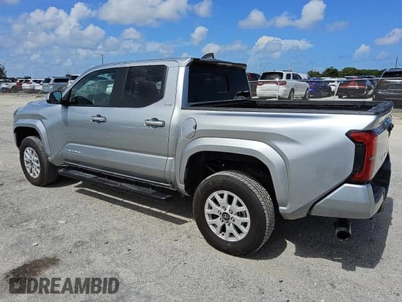 ✅ 2024 Toyota Tacoma SR5 • VIN: 3TMKB5FN8RM002169 • Lot: 60308275. Listed on Copart with 5,789 mi. Free auction sales archive from the USA and detailed vehicle history report at DreamBid. Image 2.