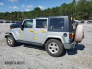 ✅ 2008 Jeep Wrangler Unlimited Sahara • VIN: 1J8GA59148L620681 • Lot: 55584085. Listed on Copart with 168,206 mi. Free auction sales archive from the USA and detailed vehicle history report at DreamBid. Image 2.