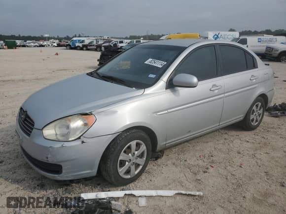 2010 Hyundai Accent GLS z VIN KMHCN4AC6AU500703, wystawiony jako Copart lot #82541114 z przebiegiem 188 357 mil mil oraz Szkoda całkowita • Salvage title. Historia ofert i sprzedaży dostępna na DreamBid. Obrazek 1.