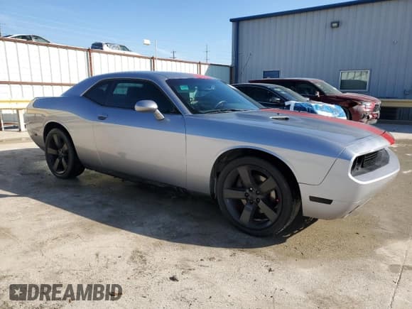 ✅ 2013 Dodge Challenger SXT • VIN: 2C3CDYAG4DH629097 • Lot: 87412034. Wystawiony na Copart z przebiegiem 152 610 mil. Bezpłatny archiwum sprzedaży aukcyjnych z USA i szczegółowy raport historii pojazdu na DreamBid. Zdjęcie 4.