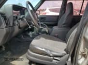 ✅ 2001 Jeep Cherokee Sport • VIN: 1J4FT48S01L612644 • Lot: 70850615. Wystawiony na Copart z przebiegiem 216 552 mil. Bezpłatny archiwum sprzedaży aukcyjnych z USA i szczegółowy raport historii pojazdu na DreamBid. Zdjęcie 7.