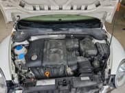 ✅ 2013 Volkswagen Beetle 2.5L • VIN: 3VWJX7AT1DM632703 • Lot: 92857275. Listed on Copart with 144,477 mi. Free auction sales archive from the USA and detailed vehicle history report at DreamBid. Image 11.