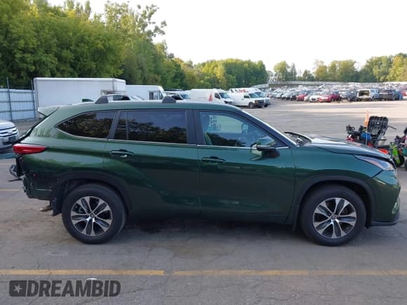 ✅ 2023 Toyota Highlander L • VIN: 5TDKDRBH5PS502742 • Lot: 43137209. Listed on IAAI with 53,095 mi. Free auction sales archive from the USA and detailed vehicle history report at DreamBid. Image 14.