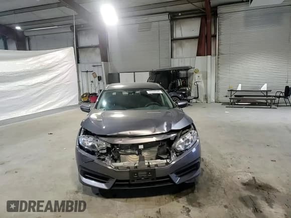 ✅ 2017 Honda Civic LX • VIN: 19XFC2F57HE230542 • Lot: 93558545. Wystawiony na Copart z przebiegiem 49 922 mil. Bezpłatny archiwum sprzedaży aukcyjnych z USA i szczegółowy raport historii pojazdu na DreamBid. Zdjęcie 14.
