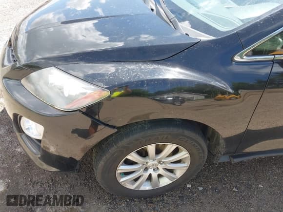 ✅ 2012 Mazda CX-7 i Touring • VIN: JM3ER2CM5C0415574 • Lot: 42263702. Wystawiony na IAAI z przebiegiem 293 566 mil. Bezpłatny archiwum sprzedaży aukcyjnych z USA i szczegółowy raport historii pojazdu na DreamBid. Zdjęcie 20.