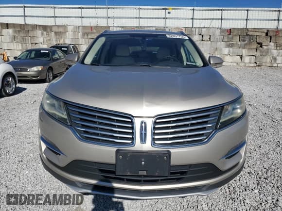 ✅ 2015 Lincoln MKC • VIN: 5LMTJ2AH0FUJ33877 • Lot: 82651755. Wystawiony na Copart z przebiegiem 137 043 mil. Bezpłatny archiwum sprzedaży aukcyjnych z USA i szczegółowy raport historii pojazdu na DreamBid. Zdjęcie 5.