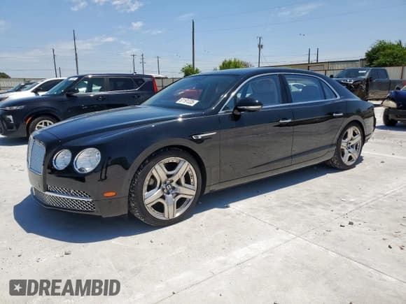 ✅ 2014 Bentley Flying Spur • VIN: SCBEC9ZA8EC088818 • Lot: 61191335. Wystawiony na Copart z przebiegiem 26 781 mil. Bezpłatny archiwum sprzedaży aukcyjnych z USA i szczegółowy raport historii pojazdu na DreamBid. Zdjęcie 1.