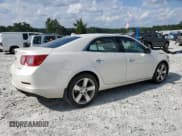 ✅ 2014 Chevrolet Malibu LTZ • VIN: 1G11J5SX6EF217283 • Lot: 69306405. Listed on Copart with 162,026 mi. Free auction sales archive from the USA and detailed vehicle history report at DreamBid. Image 3.