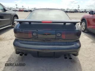 ✅ 2000 Pontiac Firebird Formula • VIN: 2G2FV22G9Y2140113 • Lot: 76135324. Listed on Copart with Not provided. Free auction sales archive from the USA and detailed vehicle history report at DreamBid. Image 6.