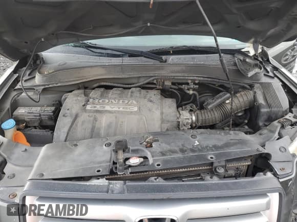 ✅ 2007 Honda Pilot LX • VIN: 5FNYF18197B016133 • Lot: 82569425. Listed on Copart with 169,550 mi. Free auction sales archive from the USA and detailed vehicle history report at DreamBid. Image 12.