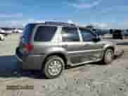 2005 Mercury Mariner Luxury с VIN 4M2CU56155DJ32163, выставлен на аукционе Copart как лот 82329855 с пробегом 270 884 миль миль и Списание • Salvage title. История ставок и продаж доступна на DreamBid. Изображение 3.