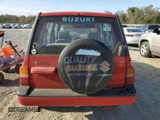 ✅ 1998 Suzuki Sidekick JS • VIN: 2S3TE02V3W6406072 • Lot: 75855544. Listed on Copart with 120,359 mi. Free auction sales archive from the USA and detailed vehicle history report at DreamBid. Image 6.