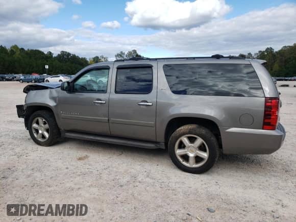 2008 Chevrolet Suburban LT с VIN 1GNFC16038J231941, выставлен на аукционе Copart как лот 76061534 с пробегом 239 562 миль миль и Списание • Salvage title. История ставок и продаж доступна на DreamBid. Изображение 2.