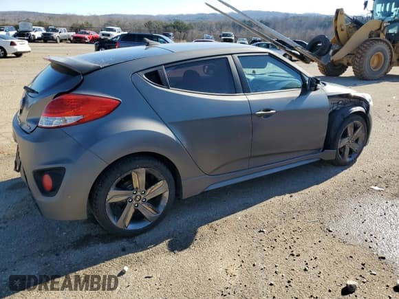 ✅ 2014 Hyundai Veloster Turbo • VIN: KMHTC6AE2EU210063 • Lot: 79243924. Wystawiony na Copart z przebiegiem 130 551 mil. Bezpłatny archiwum sprzedaży aukcyjnych z USA i szczegółowy raport historii pojazdu na DreamBid. Zdjęcie 3.