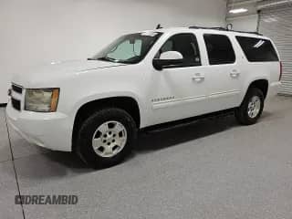 2014 Chevrolet Suburban LT z VIN 1GNSKJE73ER228258, wystawiony jako Copart lot #85601405 z przebiegiem 374 398 mil mil oraz Czysty tytuł • Clean title. Historia ofert i sprzedaży dostępna na DreamBid. Obrazek 1.