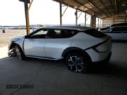 ✅ 2022 Kia EV6 Light • VIN: KNDC34LBXN5078370 • Лот: 80765585. Опубликован ранее на Copart с пробегом 49 108 миль. Бесплатный доступ к архиву аукционных продаж из США и подробный отчёт об истории автомобиля на DreamBid. Изображение 2.