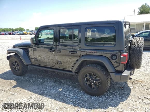 ✅ 2021 Jeep Wrangler Unlimited Willys • VIN: 1C4HJXDN1MW584099 • Lot: 56544645. Listed on Copart with 81,143 mi. Free auction sales archive from the USA and detailed vehicle history report at DreamBid. Image 2.