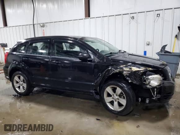 2010 Dodge Caliber SXT with VIN 1B3CB4HA0AD602517, listed as a Copart auction lot 85323475 with 40,840 mi miles and Salvage title. Bid and sale history available at DreamBid. Image 4.