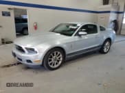 ✅ 2011 Ford Mustang V6 • VIN: 1ZVBP8AM7B5135869 • Lot: 86853205. Listed on Copart with 210,446 mi. Free auction sales archive from the USA and detailed vehicle history report at DreamBid. Image 1.