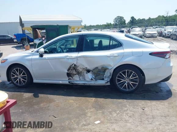 2022 Toyota Camry XLE with VIN 4T1F11AK2NU710770, listed as a IAAI auction lot 42604063 with 5,840 mi miles and . Bid and sale history available at DreamBid. Image 14.