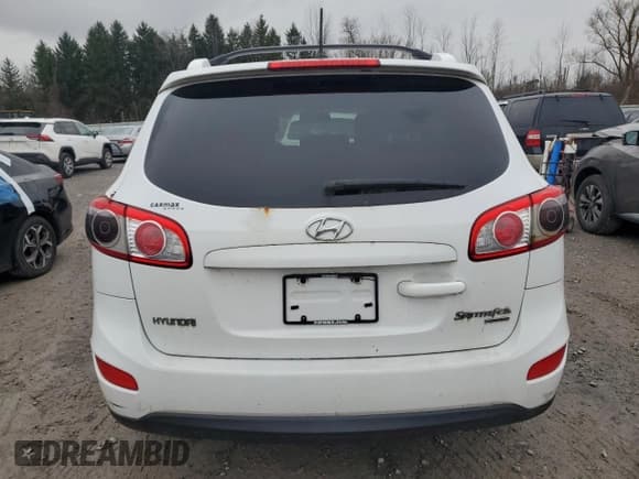 ✅ 2011 Hyundai Santa Fe SE • VIN: 5XYZHDAG5BG007929 • Lot: 82100674. Listed on Copart with 153,661 mi. Free auction sales archive from the USA and detailed vehicle history report at DreamBid. Image 6.