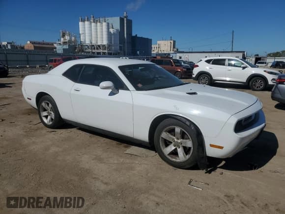 ✅ 2013 Dodge Challenger SXT • VIN: 2C3CDYAGXDH646082 • Lot: 73335194. Wystawiony na Copart z przebiegiem 219 508 mil. Bezpłatny archiwum sprzedaży aukcyjnych z USA i szczegółowy raport historii pojazdu na DreamBid. Zdjęcie 4.